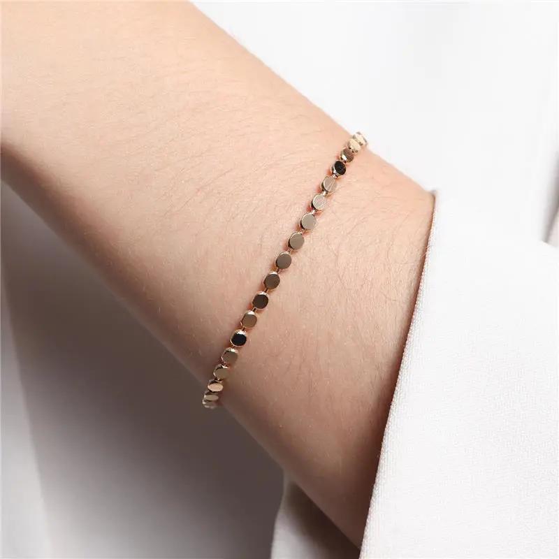 Pulseira Esferas Achatadas Douradas