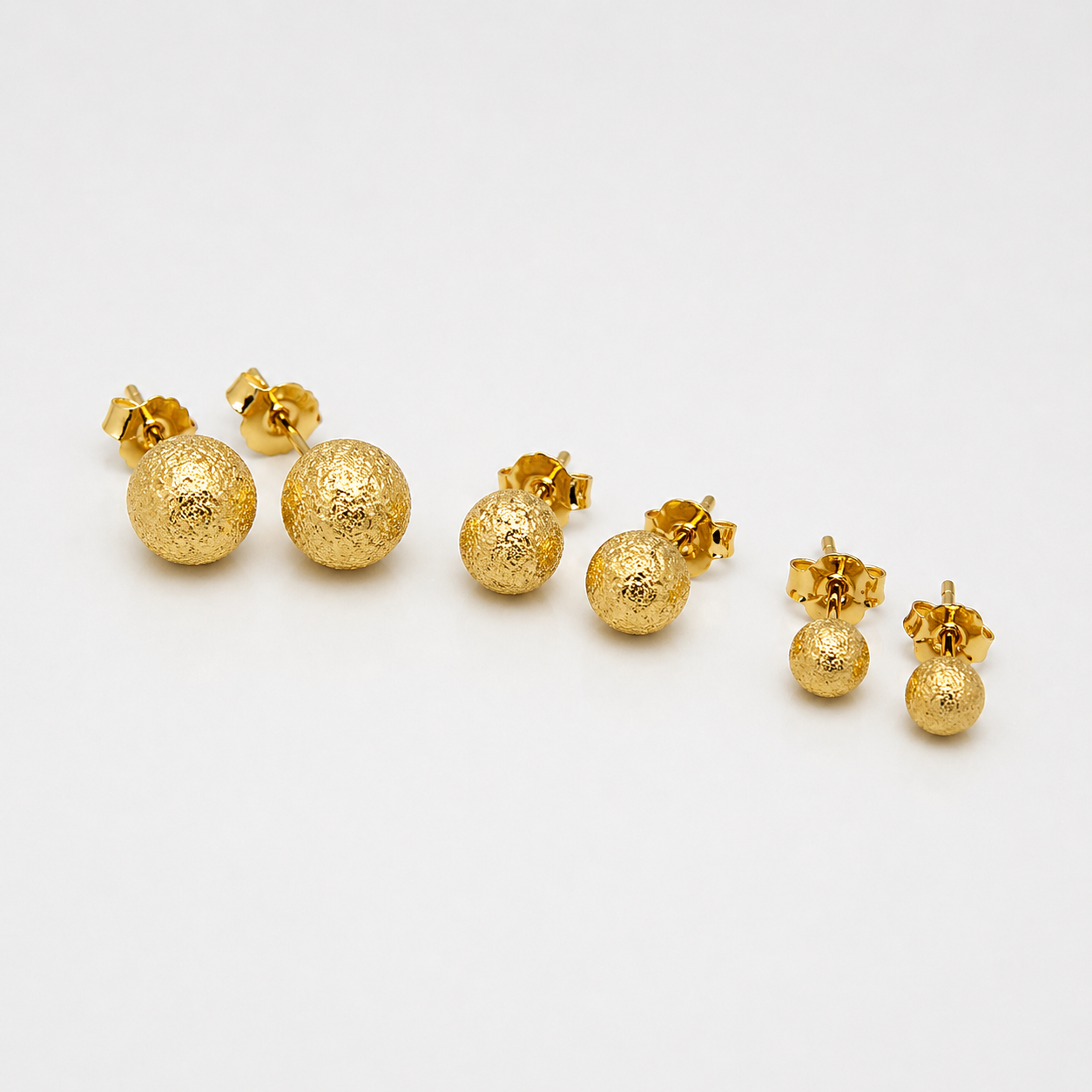 Trio de Esferas Foscas Banhadas a Ouro 18k